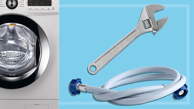 washing machine with a spanner and hose